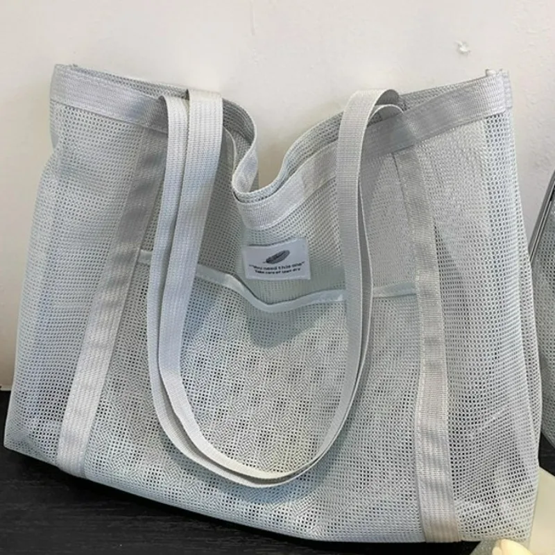 2026 شبكة مجوفة سعة كبيرة حقيبة التخزين المحمولة المرأة متعددة الوظائف شبكة حقيبة كتف السفر حقيبة شفافة حقائب الشاطئ #4