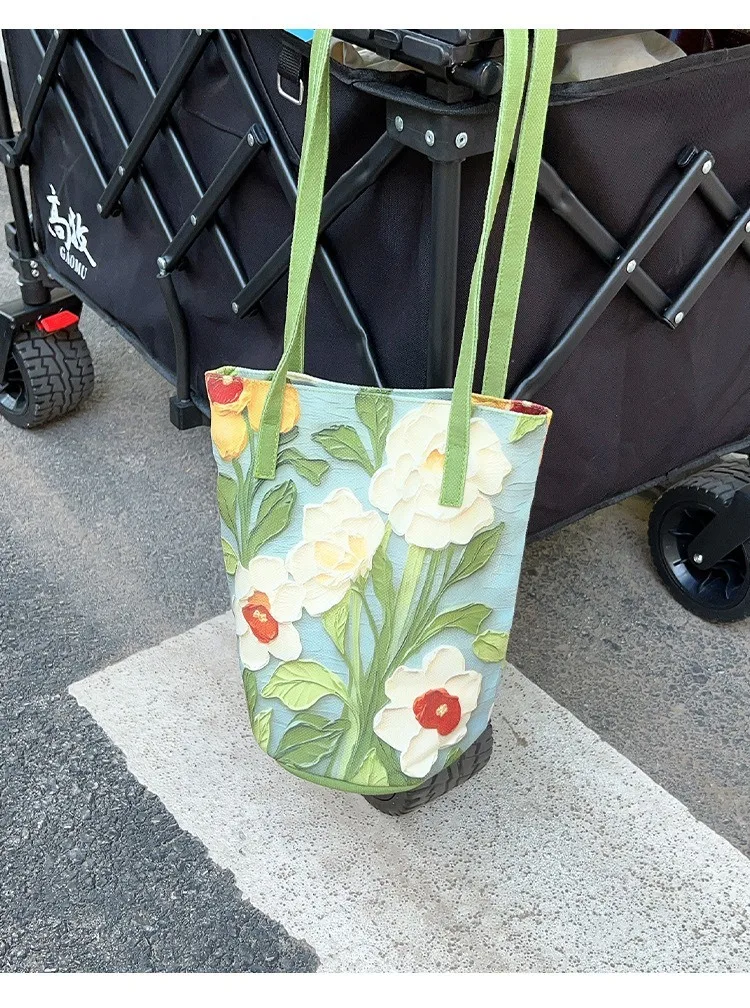 2025 تصميم جديد الأزهار دلو حقيبة المرأة الكتف Crossbody النفط اللوحة زهرة تصميم عارضة أزياء سعة كبيرة حمل حقيبة