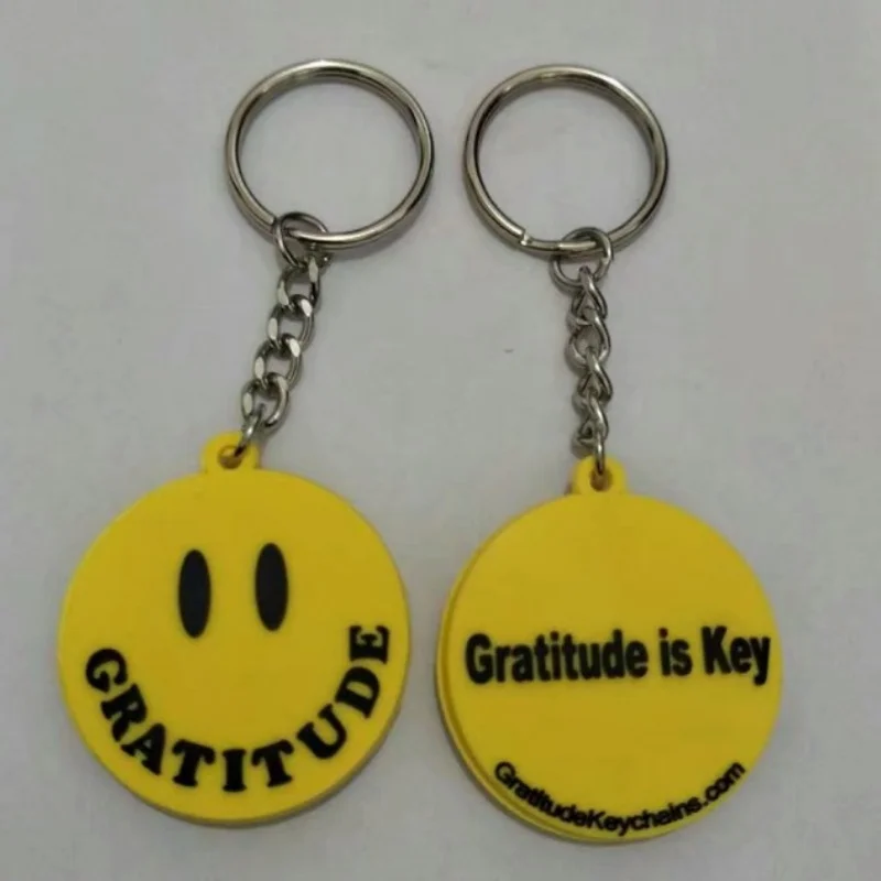 Corrente chave personalizada do PVC com cara do sorriso, amarelo