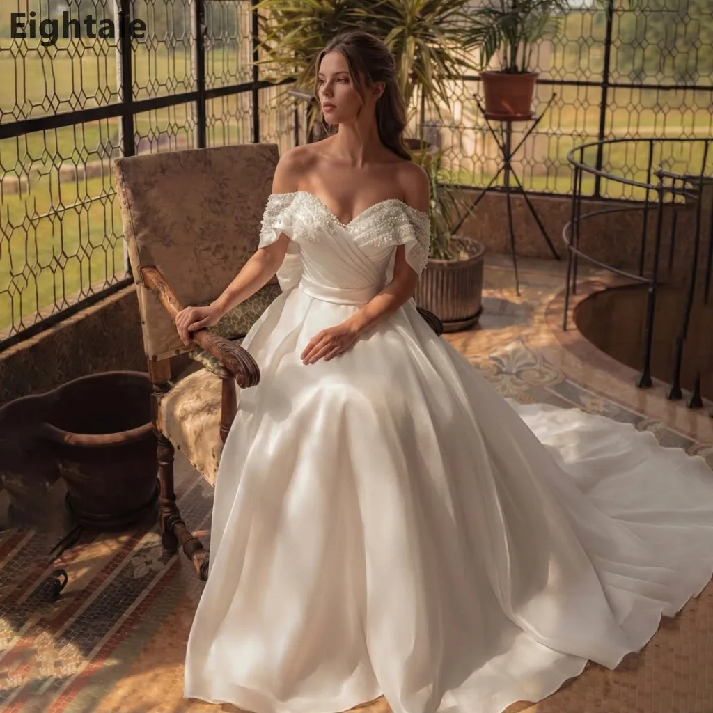 2026 New Arrival Ivory Organza Wedding Dress Off-the-Shoulder Pearl Beading Ball Gown with Chapel Train Customized Bridal Gown