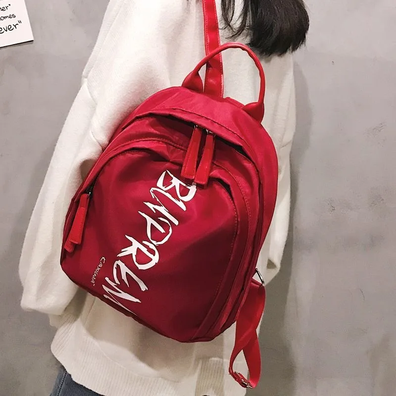 

online celebrity backpack female New style letter Backpack campus all-match School bag travel Korean version nylon