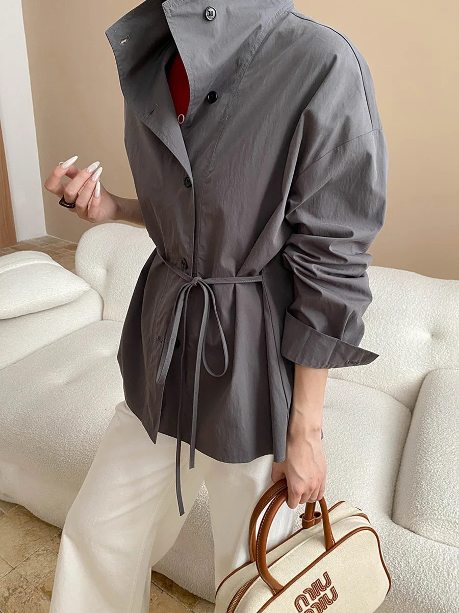 

Stand up collar paper like silhouette strap, waist cinching temperament, casual windbreaker jacket