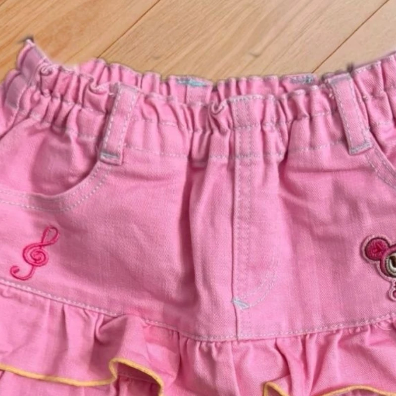 الوردي Kawaii لوليتا نمط مطوي التنانير اليابانية أزياء المرأة الحلو الكرتون الأرنب التطريز كعكة التنانير الصغيرة Y2k Faldas Mujer