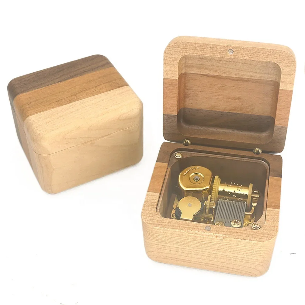 

Wholesale Wooden Custom Stitching Three-color Solid Wood Music Box Clockwork Music Box DIY Gift Company Gift Factory Direct Sale