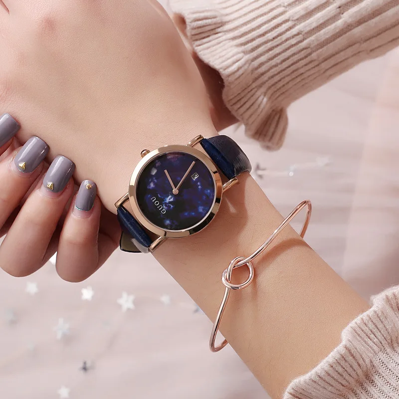 新しいトレンディなカレンダーダイヤルのカジュアルなクォーツレディースウォッチ、レザーストラップ付き、ユニークな時計であり、女性への完璧なギフトです。