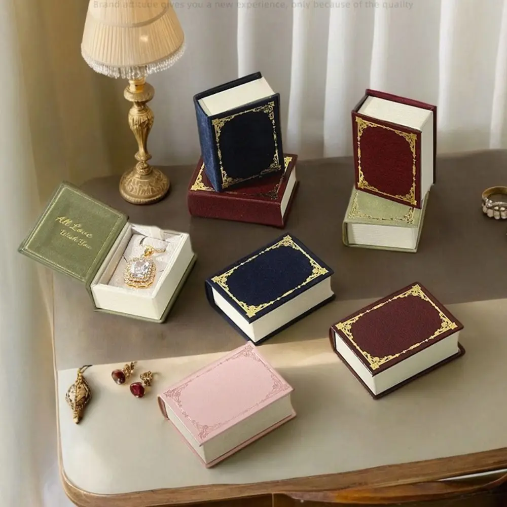 

Durable Creative Book Shape Ring Box Flip Lid Velvet Engagement Ring Case Storage Box Magnetic Jewelry Packaging Travel