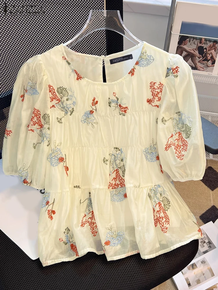 

ZANZEA Womens Vacation Casual Tiered Blouses 2025 Summer O-Neck Short Puff Sleeve Floral Print Blusas Mujer Day Wear Smock Tops