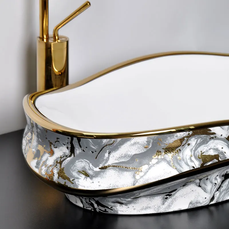 wave shaped special-shaped platform basin light luxury electroplating personalized Chinese ceramic Phnom Penh basin