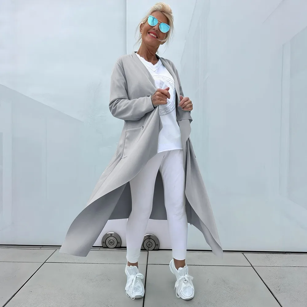 เสื้อแจ็คเก็ตลำลองแบบใหม่ปี 2025 เสื้อโค้ทเทรนช์ยาวแฟชั่น เสื้อคลุมคาร์ดิแกนสีพื้นแขนยาว เสื้อคลุมทรงไม่สมมาตร เสื้อแจ็คเก็ตฤดูใบไม้ร่วงสำหรับผู้หญิง