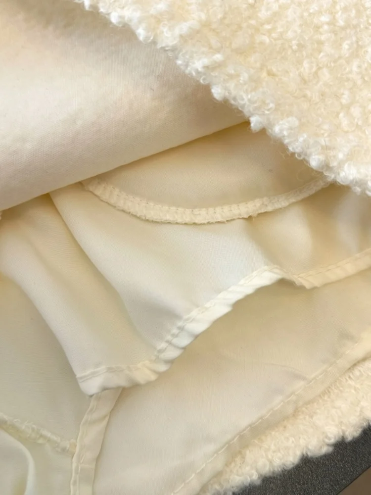 SMTHMA Schwarz-Weiß-Wollrock im französischen eleganten Stil mit niedriger Taille und blendendem Modedesign-Kurzrock für Damen