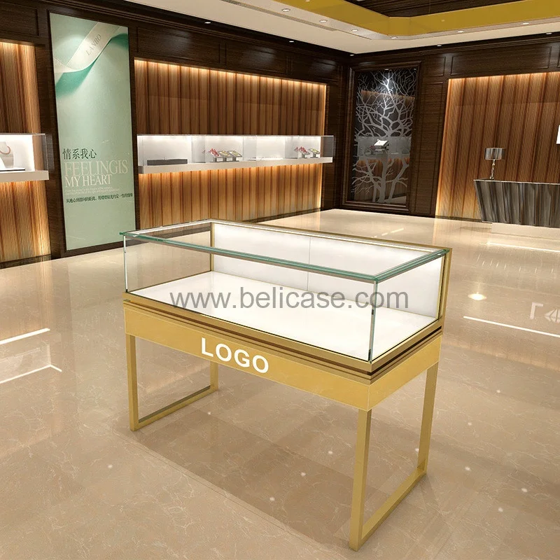 Custom, fashionable jewelry stand showcase table for jewellery with LED strip light gold stainless steel jewelry showcase furnit