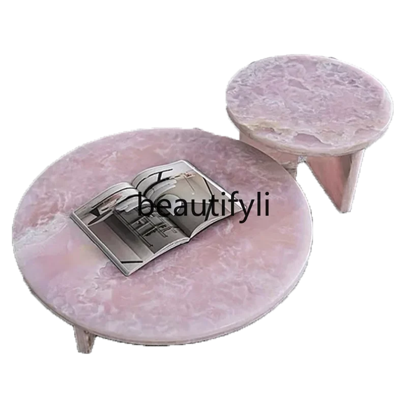 

Italian light luxury natural pink marble coffee table round edge few crystal jade coffee table combination