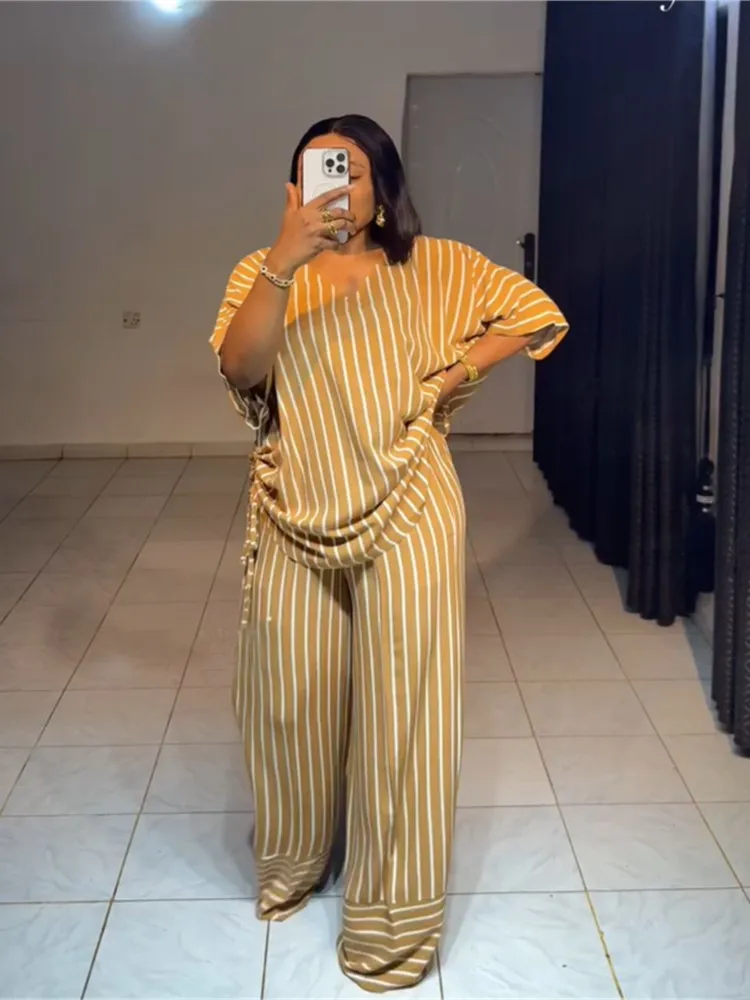 

Летний комплект из двух предметов с полосатым принтом для женщин: топ с V-образным вырезом и короткими рукавами, широкие брюки, для отпуска, пляжа, уличной моды.