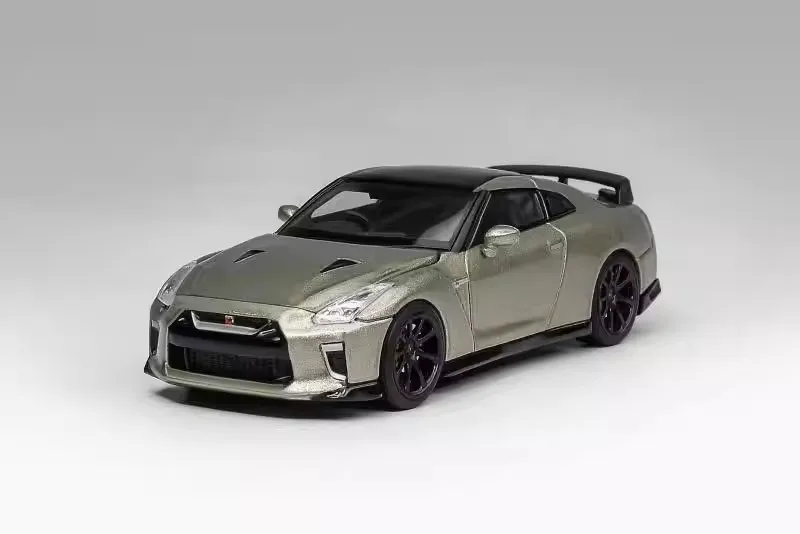 

Модель автомобиля MH 1/64 Nissan GT-R R35 Track Edition, разработанная NISMO T-Spec, зеленого цвета.