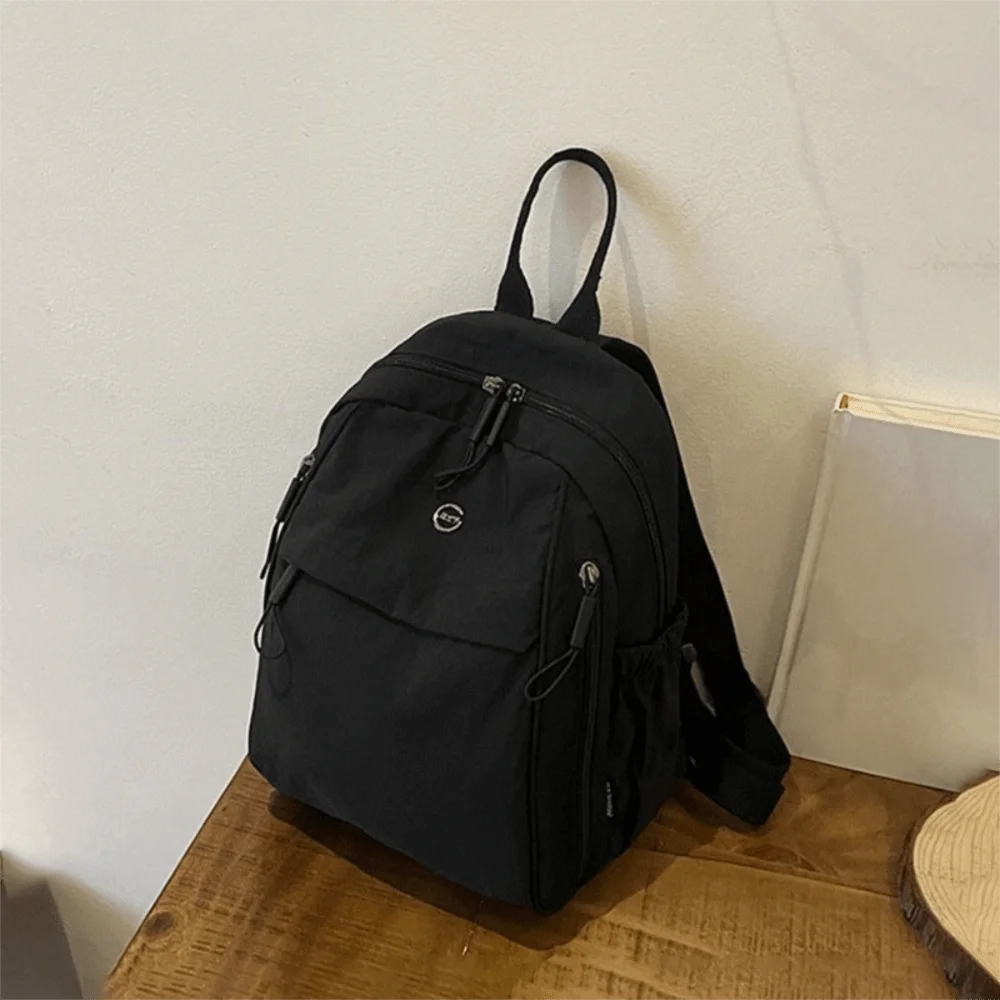 حقيبة ظهر من قماش أكسفورد بلون سادة، خفيفة الوزن، سعة كبيرة، حقيبة كروس كاجوال من النايلون، حقيبة ظهر كاجوال خفيفة الوزن للسفر #1