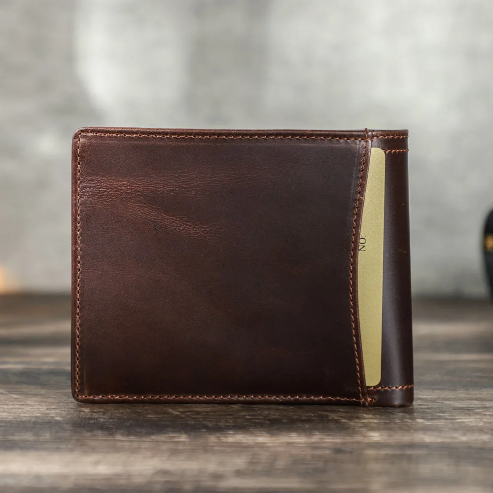 กระเป๋าสตางค์หนังผู้ชายแฟชั่นหรูหราปี 2026 กระเป๋าเงินขนาดเล็กแบบมีซิปพร้อมช่องใส่เหรียญ กระเป๋าสตางค์แบบพับสองตอนสำหรับผู้ชาย พร้อมช่องใส่บัตรและช่องใส่เงิน