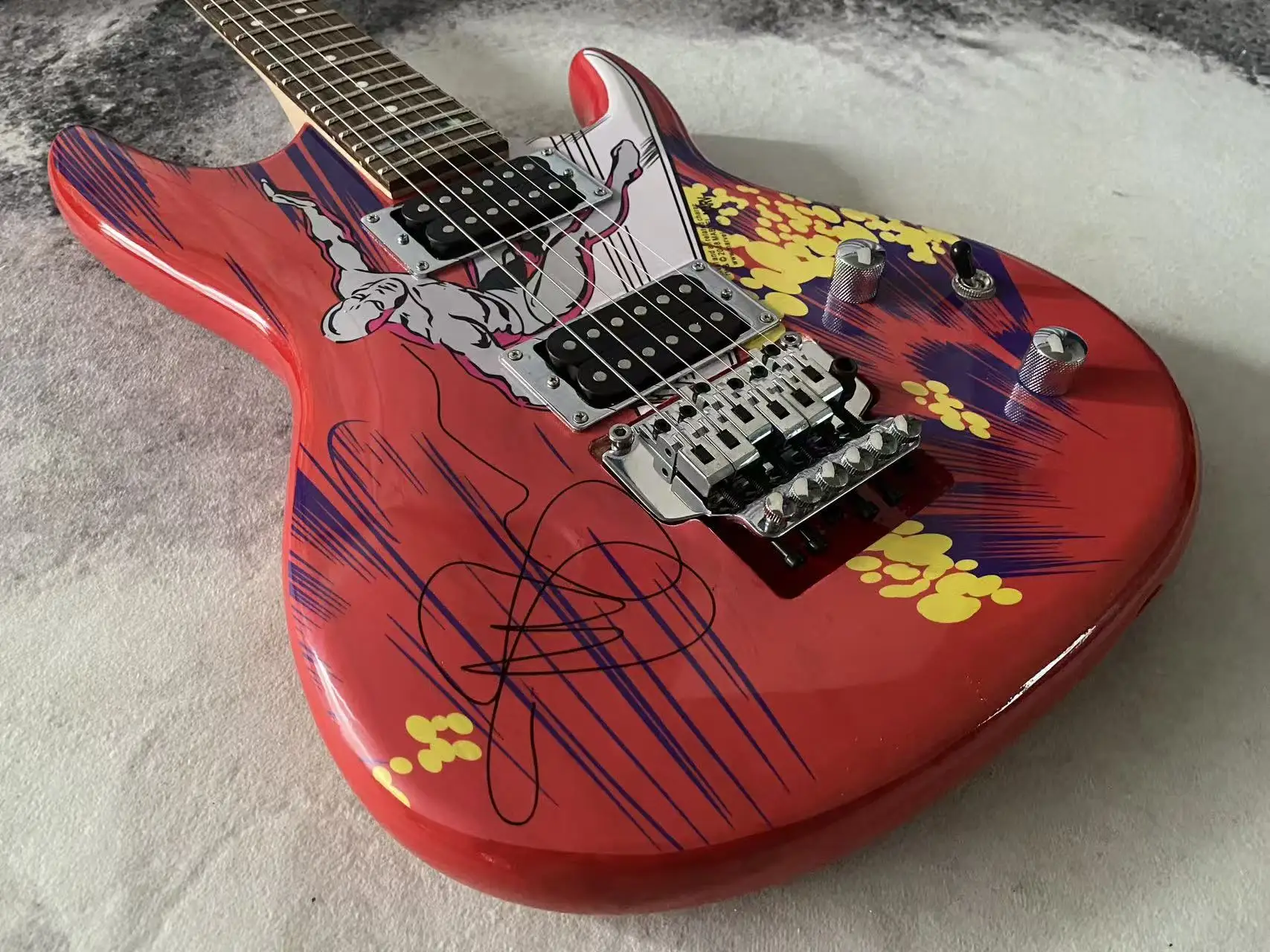 Solid‑Body 6‑String Electric Guitar, Comic‑Style Graphic Print Finish, Double Humbucker Pickups, Double Locking Tremolo System,