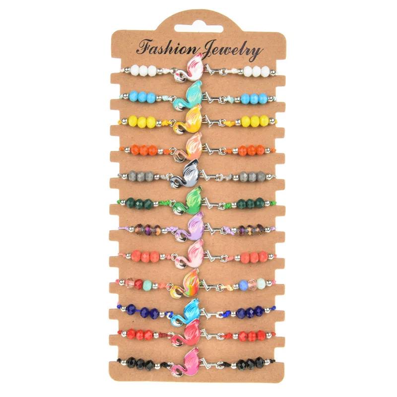 مجموعة مكونة من 12 قطعة من سبائك الزيت الأوروبية والأمريكية المطلية بالخرز الكريستالي الملون يدويًا وسوار منسوج قابل للتعديل للنساء