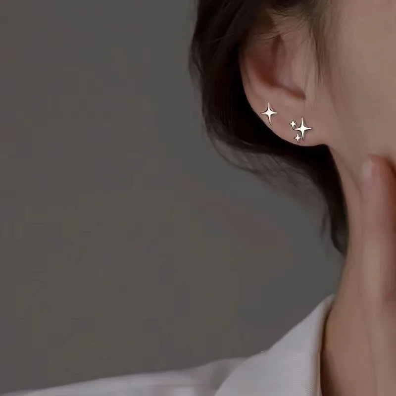 Asymmetric Silver Four Point Star Stud Earrings