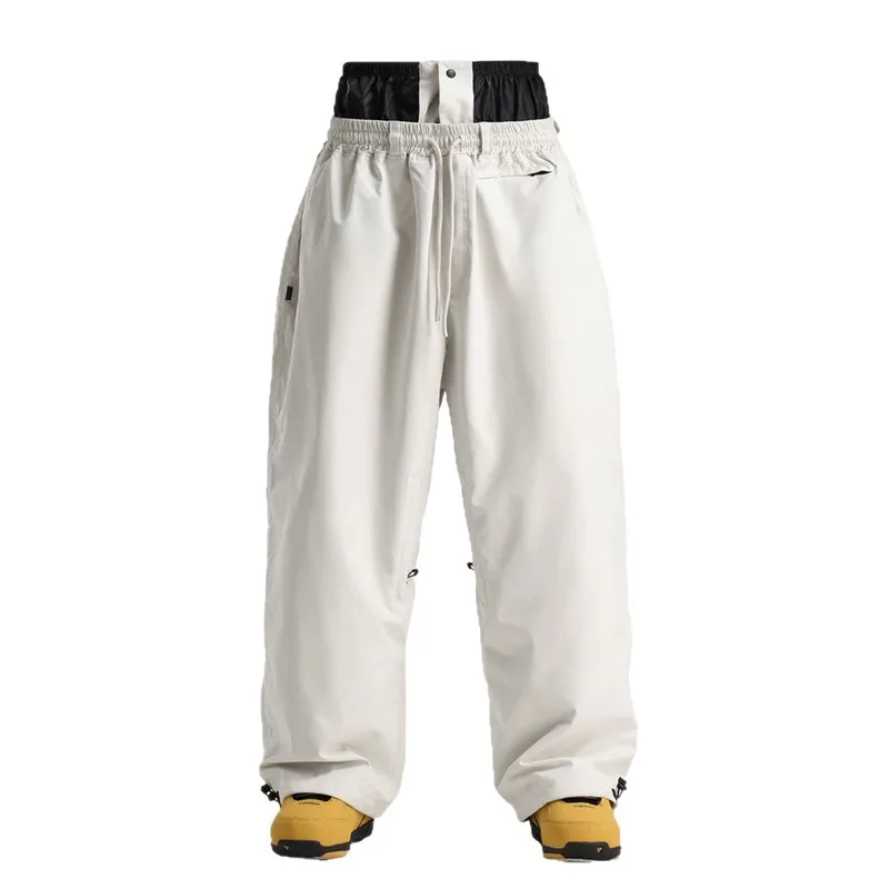 冬のマウンテンスポーツ男性スキーズボン屋外ハイキング女性スノーパンツ緩い防水女性スノーボード服着用