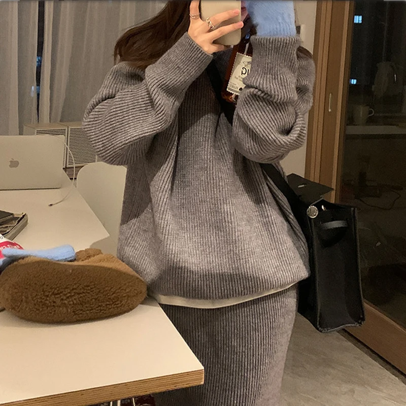 

2025 autumn and winter new lazy style simple high neck knitted sweater+mid to long high waist slimming skirt two-piece set