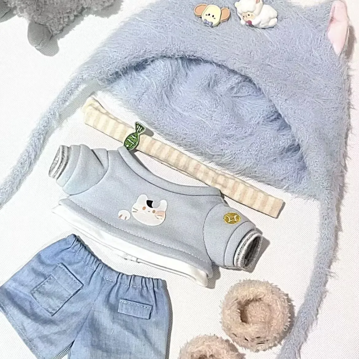 

The kitten specially mixed 20cm cotton doll doll dress is cute and fluffy. The doll dress is light blue for changing outfits