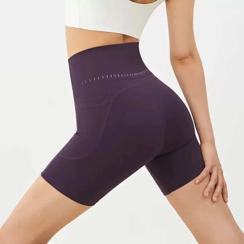 High-Waist Four-Quarter Yoga Pants Women's Pocket Sports Shorts with Butt-Lifting Design for Cycling Fitness Running