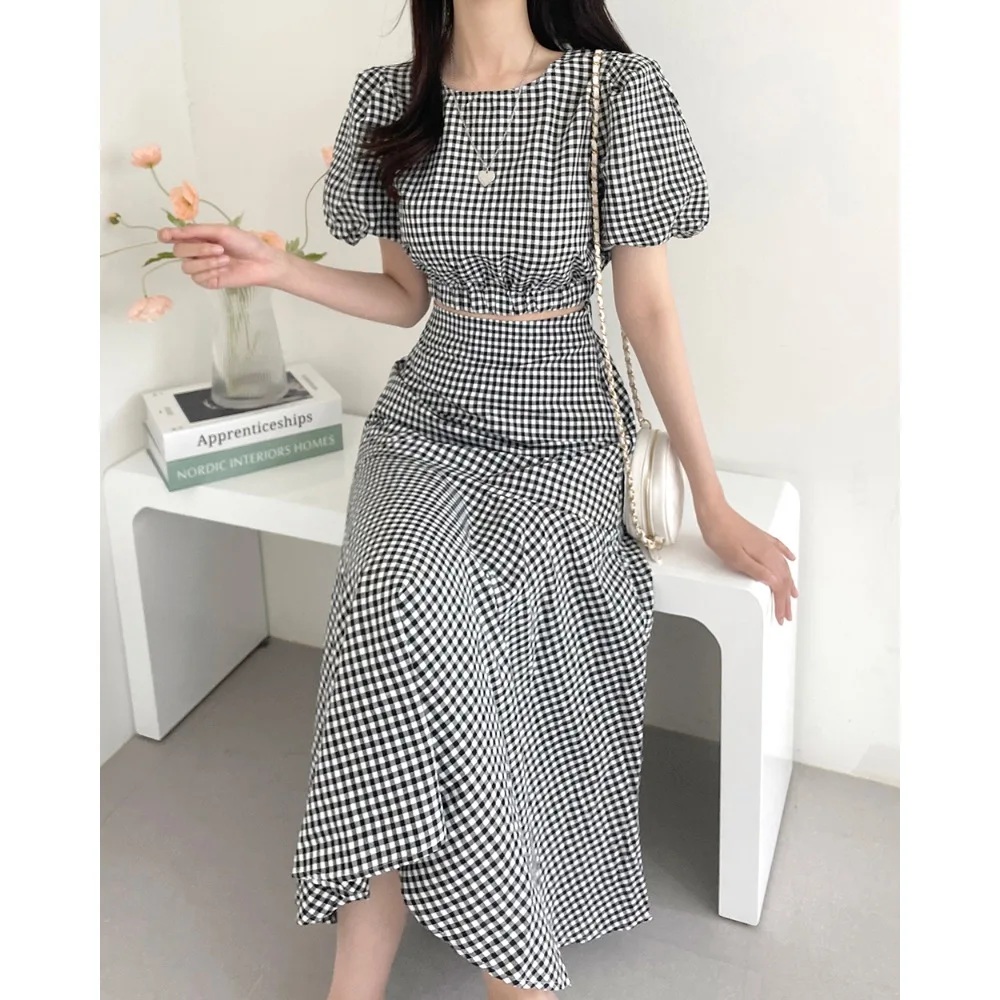 

2026 Summer New Fashion Holiday Set Women's High Waist A-Line Bubble Sleeve Top And Plaid Skirt Two-Piece Korean Style