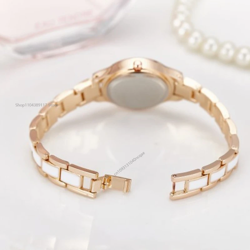 レディース腕時計エレガントな女性の腕時計クォーツ女性へのギフト高級ファッションステンレス鋼合金女性の腕時計アクセサリー