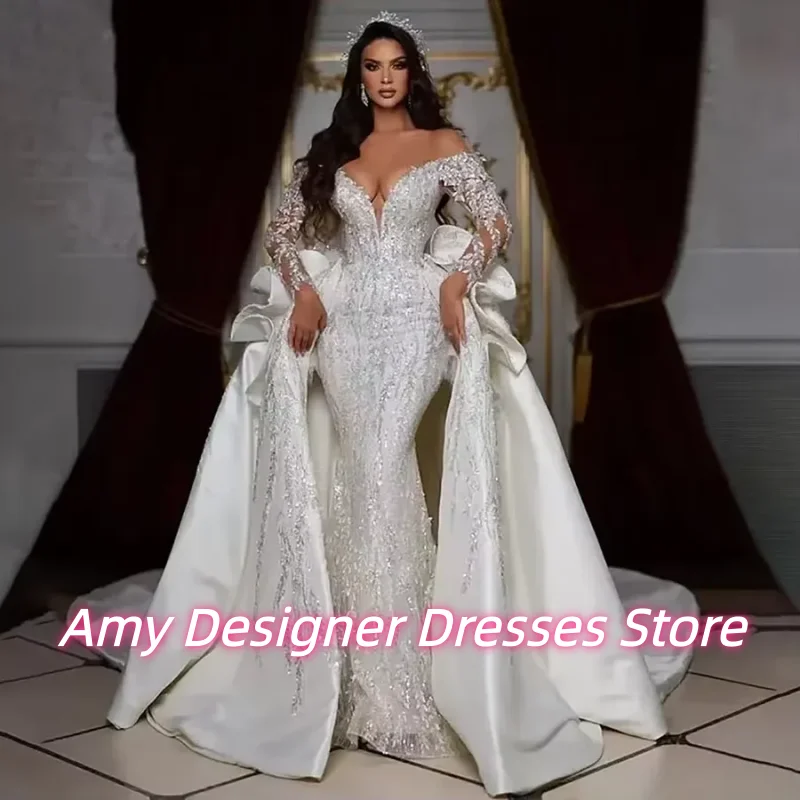 فستان زفاف نيجيري طويل مكشوف الكتفين مخصص لعام 2025 مع ذيل قابل للانفصال مزين بالخرز فساتين العروس فيستدو دي نوفيا #1