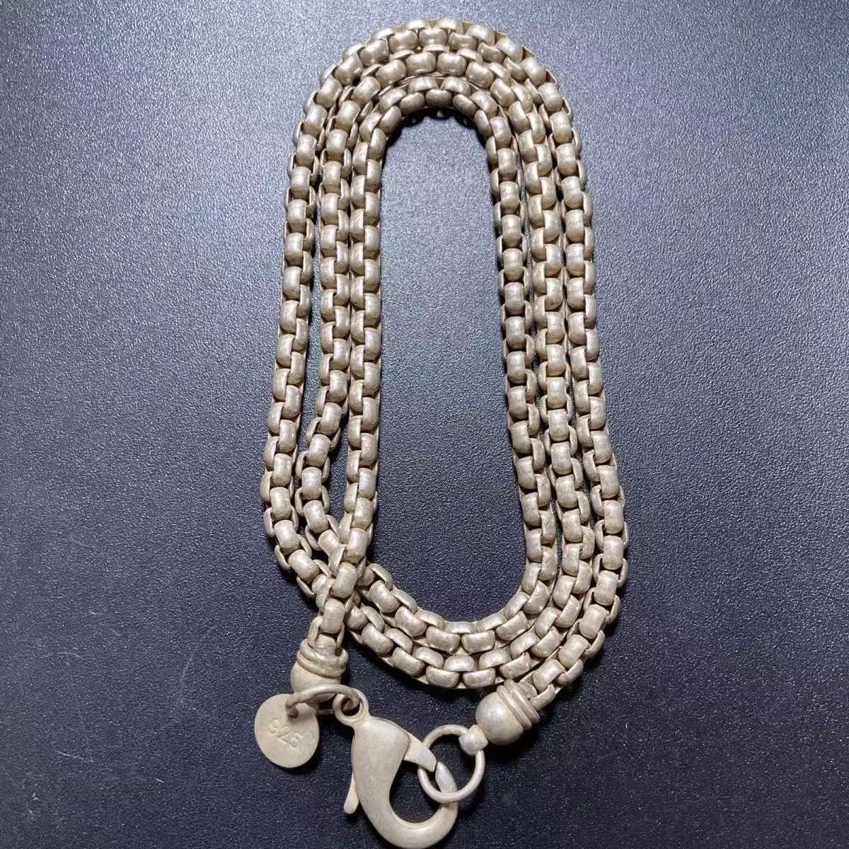 This collection features hand-carved Tibetan Miao silver necklaces that are suitable for both men and women