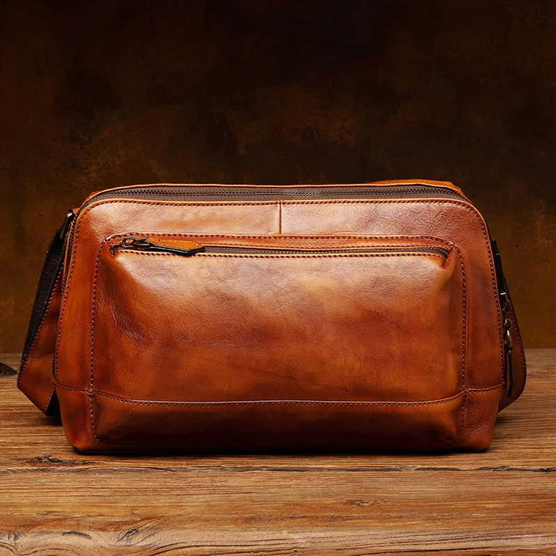 Casual messenger bag men's first leather shoulder bag leather men's bag fashion Korean handmade backpack tide brand.