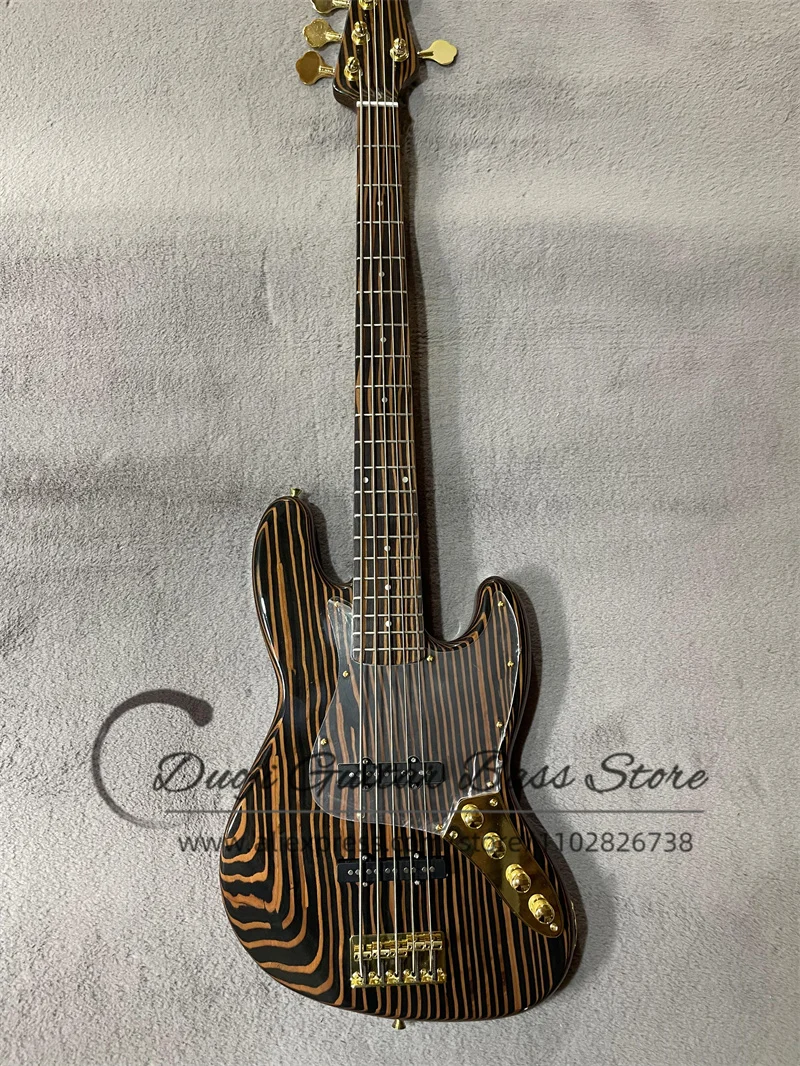 5 string Electric Bass Zebra Wood Body Zebra Wood Neck Acrylic Pickupguard Fixed Bridge Chrome Button Active Battery