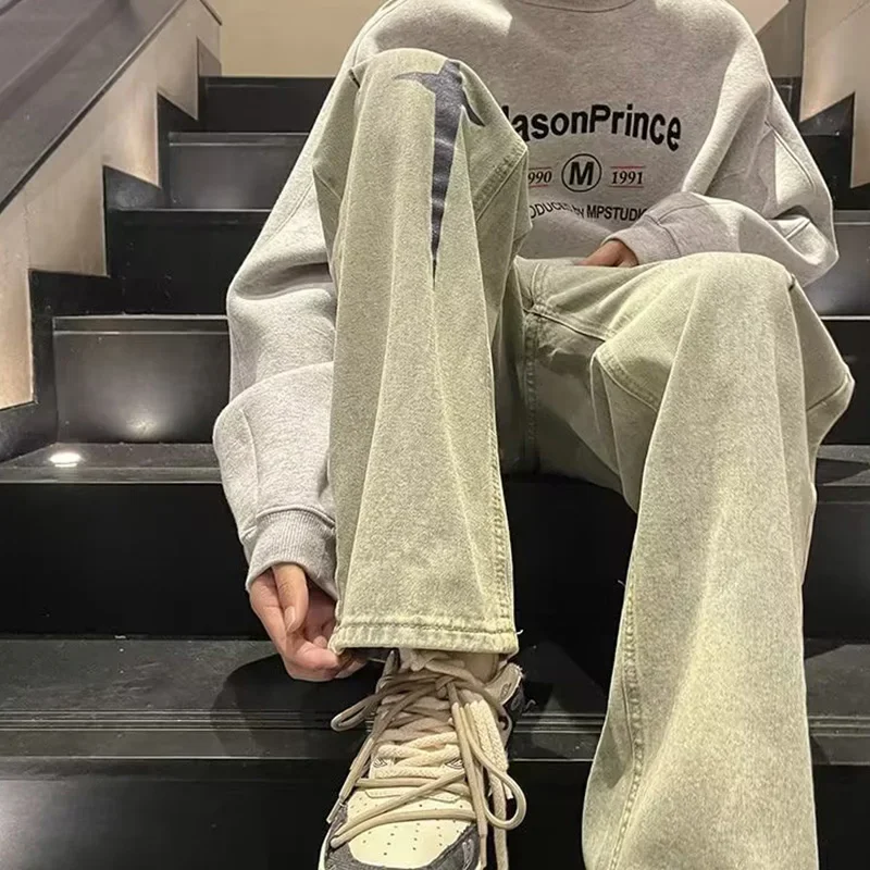 2025 ขายร้อน Distressed พิมพ์กางเกงยีนส์ผู้ชายใหม่หลวม Bell Bottoms อินเทรนด์ Hip Hop ตรงกางเกงสบายๆสไตล์อเมริกันกางเกงยีนส์ผู้ชาย