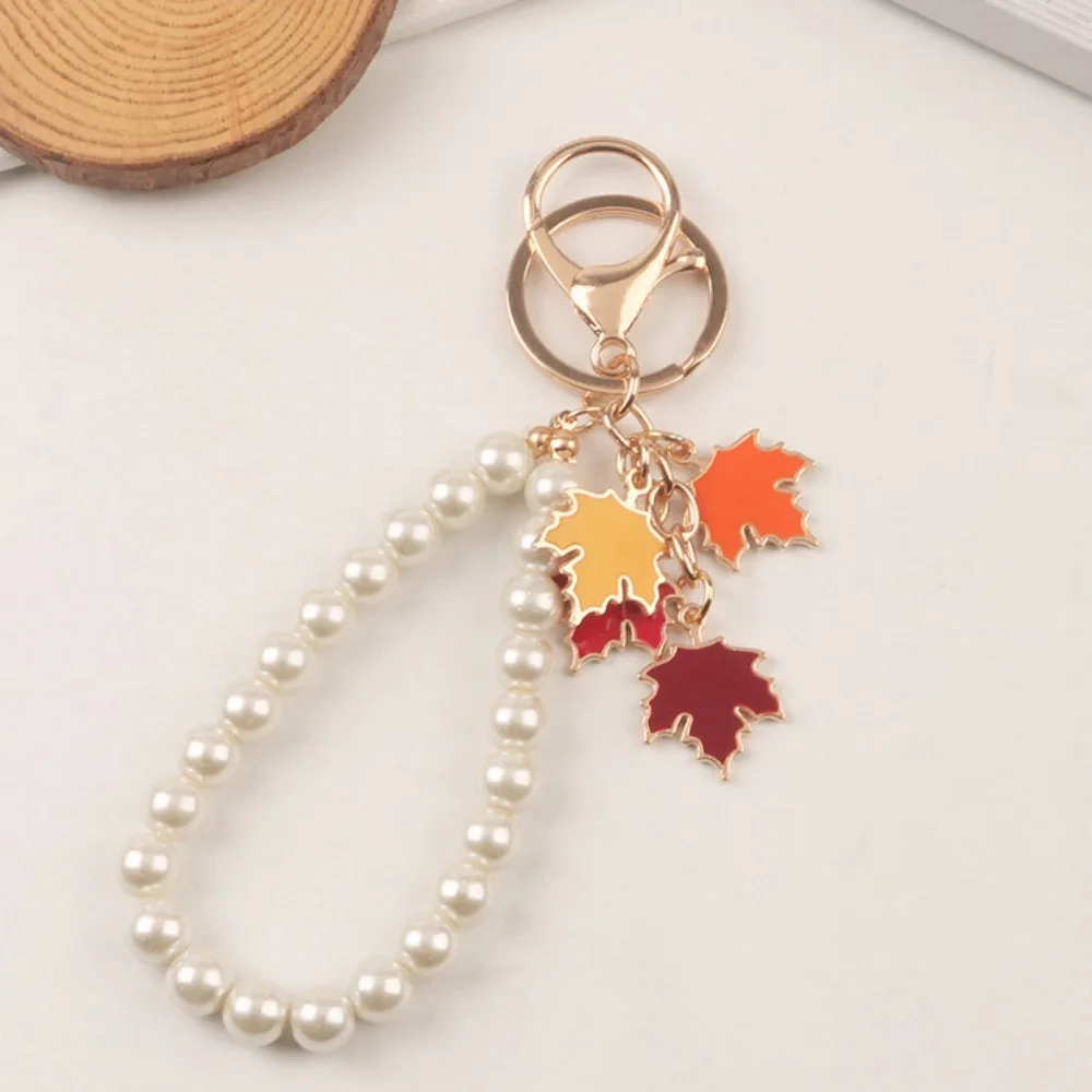 

Maple Leaf Maple Leaf Keychain with Pearl Lanyard Charms Enamel Plant Key Rings Creative Fashion Leaf Metal Keyring Women