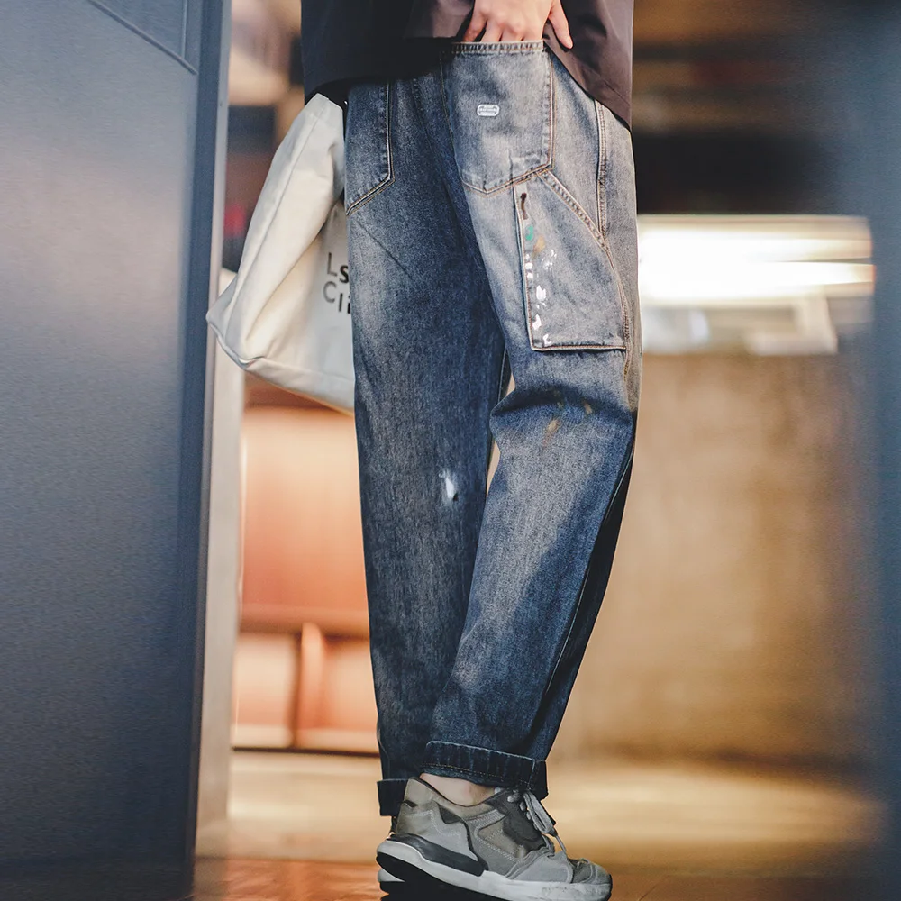 Maden Jeans Graffiti azzurri con inchiostro Splash per uomo Pantaloni da registrazione a gamba dritta lavati con texture fiammato da 9,2 OZ Jeans streetwear autunnali