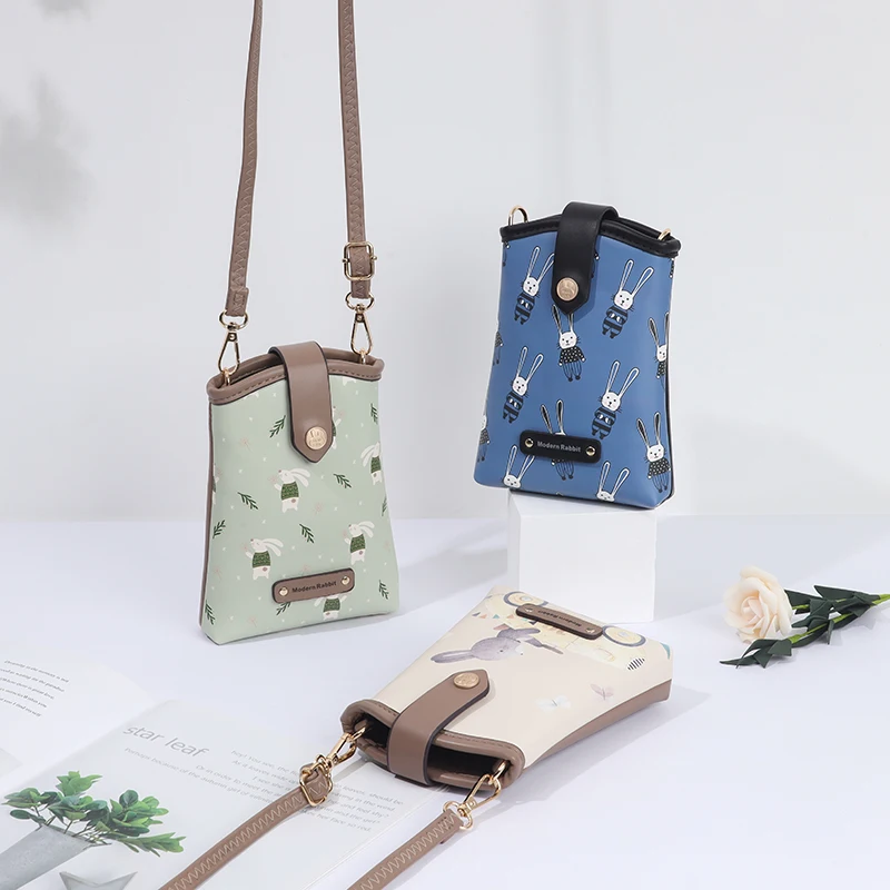 Crossbody bag 2024 spring/summer new high-end boutique PU leather cute cartoon buckle mobile phone bag Fashion sports everything