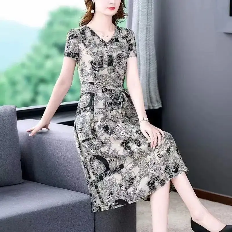 Mode V-Ausschnitt Kurzarm bedruckte Bandage Vintage Kleid Damen bekleidung Sommer neue lose Büro Dame Blumen kleider