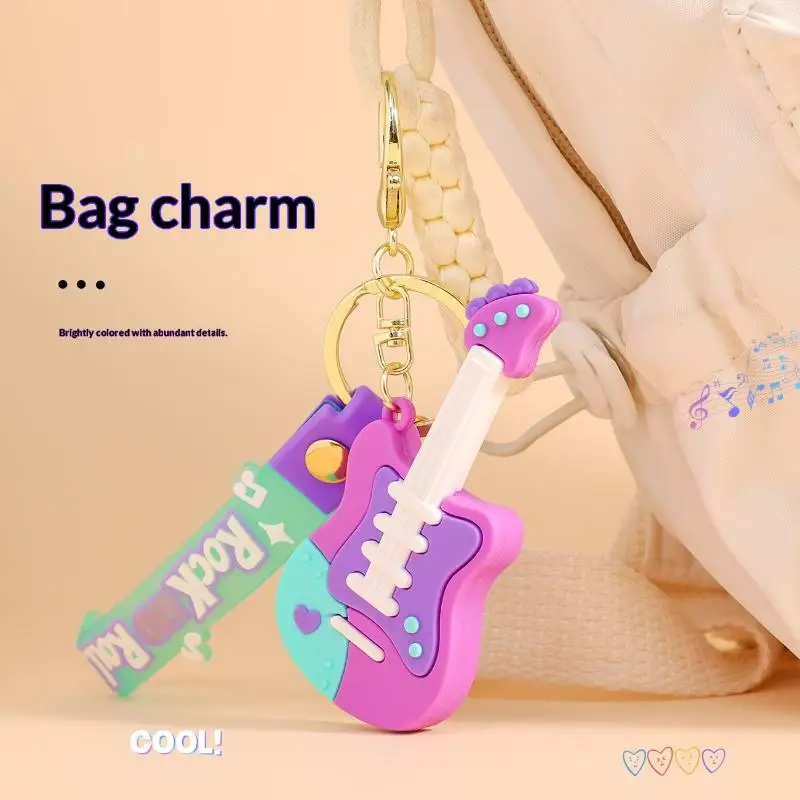 Niedlicher Cartoon-Gitarren-Schlüsselanhänger aus Silikon mit Handschlaufe, Pastell-Design für Taschendekoration, Geschenk für Musikliebhaber – Detail 5