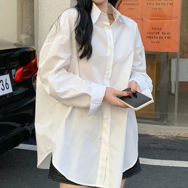 

Осенняя новая свободная однотонная рубашка-поло с воротником-поло, универсальная простая нишевая рубашка средней длины для женщин