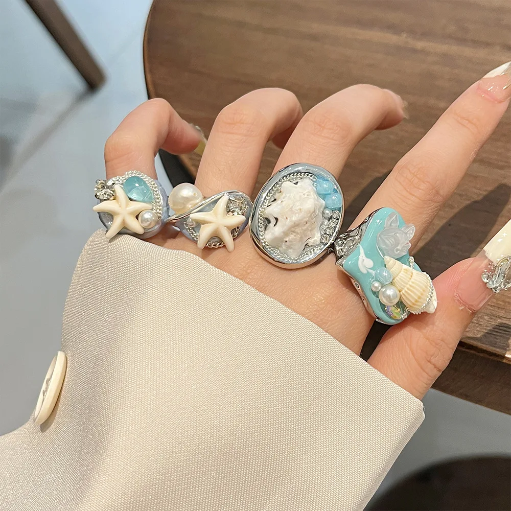 

Summer vacation style ocean element ring, pearl conch shell starfish ring, niche design, high-end index finger ring