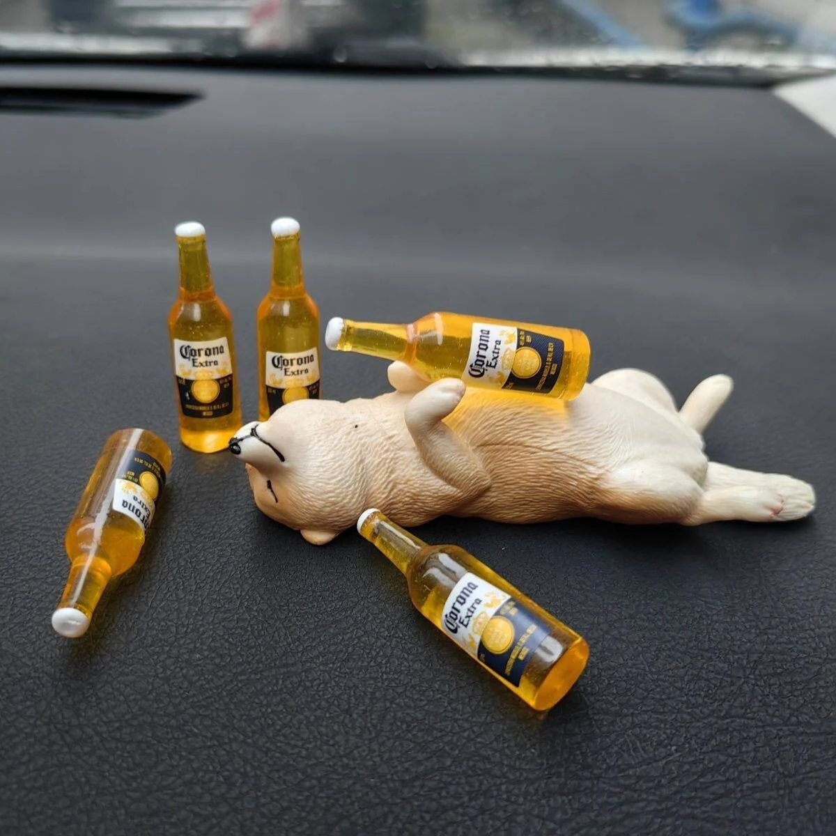 Adorable drunken sleeping Shiba Inu figurine, mini resin animal, fun and realistic puppy model, creative holiday party gift.