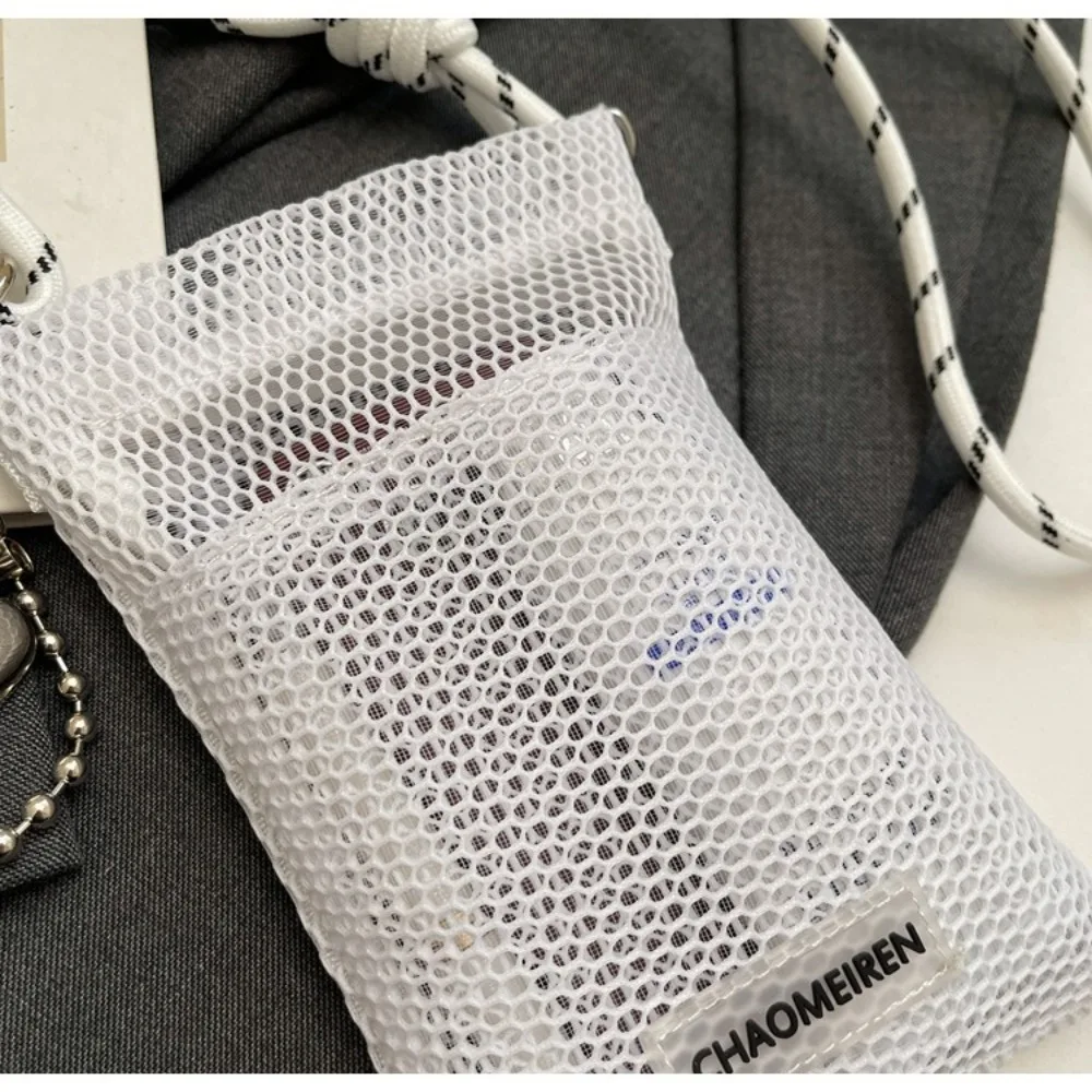 Portafoglio coreano alla moda in rete di nylon tinta unita borsa a tracolla per adolescenti borse a tracolla borsa per cellulare cava unisex