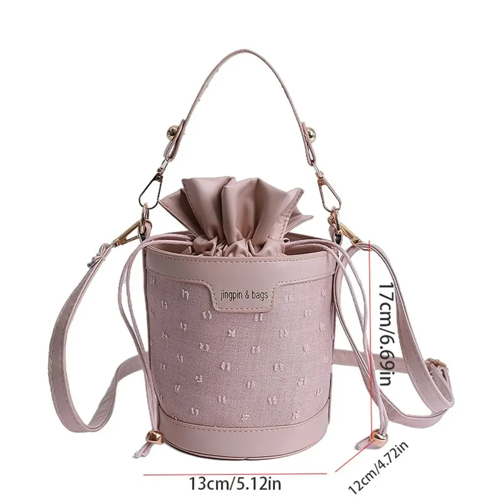 حقيبة دلو برباط على الطراز الكوري غير رسمية حقيبة يد أسطوانية من البولي يوريثان حقيبة كتف محمولة بلون سلة خضراوات حقيبة للفتيات