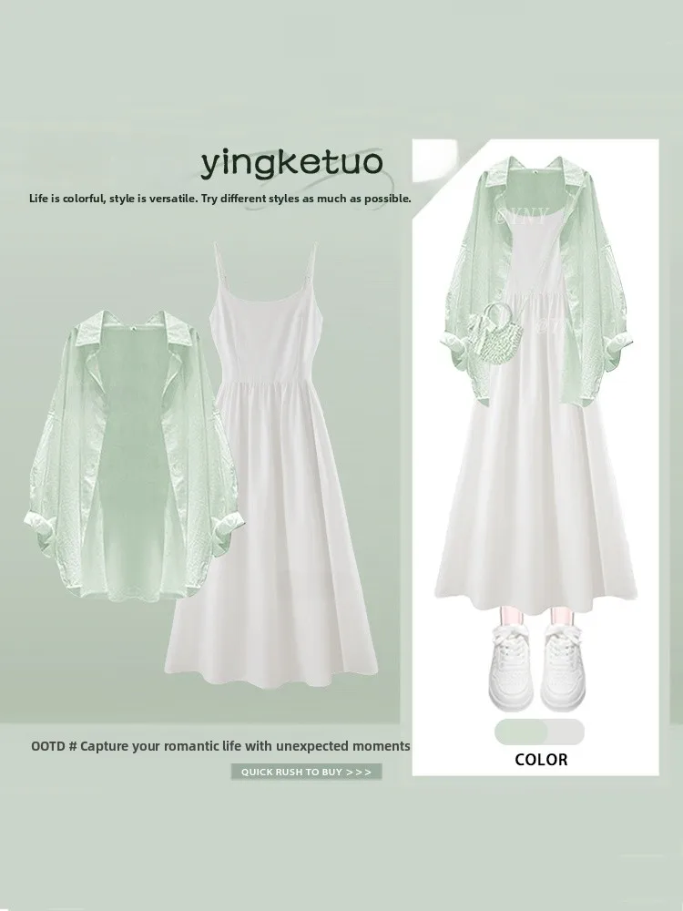 

Летний прохладный комплект: зеленая свободная рубашка с защитой от солнца и платье с завязками на талии – модный женский ансамбль