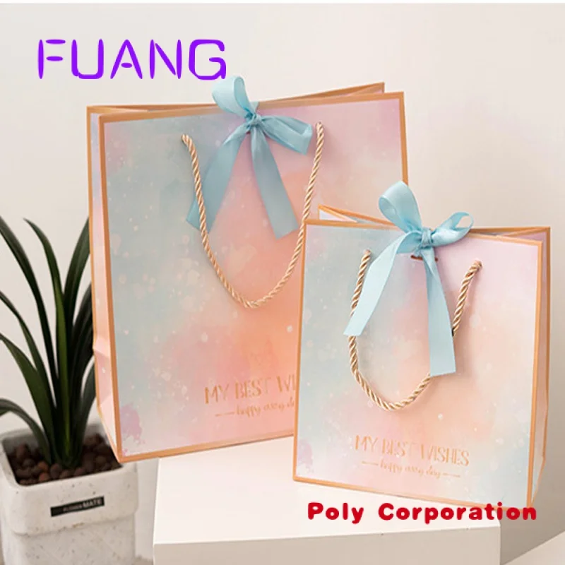 Custom  Factory Price Custom Logo Printed Pink Packaging Paper Bag With Handle And Ribbon gift shopping bag