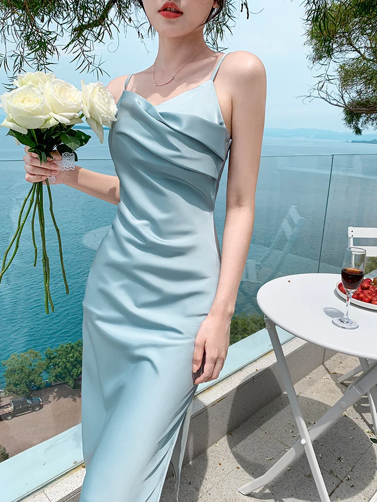 الصيف الحمالات فستان طويل المرأة الجنية بلون فستان بلا أكمام الإناث أنيقة سوينغ طوق الساتان حزام فستان الشاطئ C174