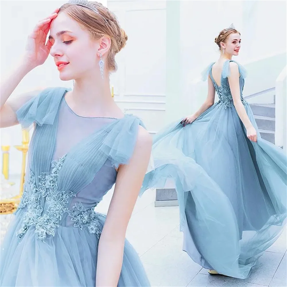 Elegante Sweep Train Illusion Bodices abiti da sera abiti da ballo senza maniche pieghe Tulle azzurro una linea abiti da sera