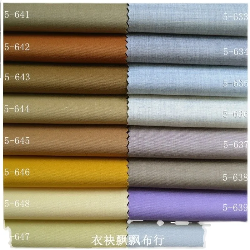 The fabric for suit is fine-spun yellow light beige woolen suitable trousers and skirts
