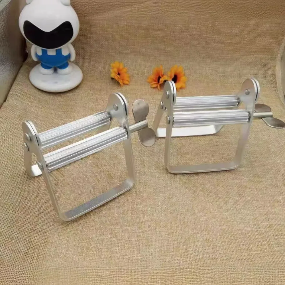 

Mini Rolling Toothpaste Squeezer Tightener Squeezing Tool Tube Wringer Aluminum Silver Tooth Paste Dispenser Hand Cream